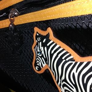 NWOT Big Travel Puffy Zebra Bag